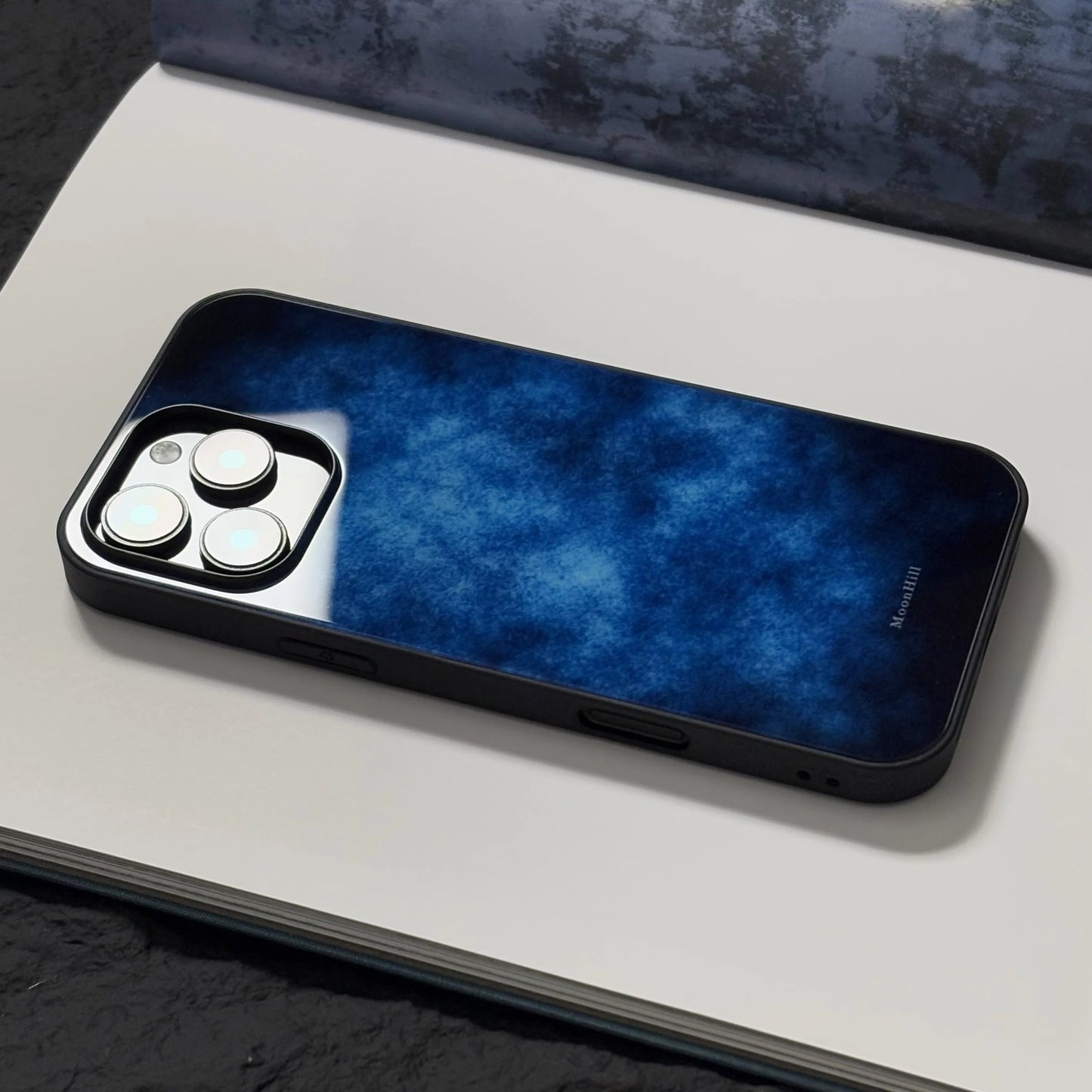 Mysterious lake surface art design, anti-slip, full-coverage glass premium phone case.