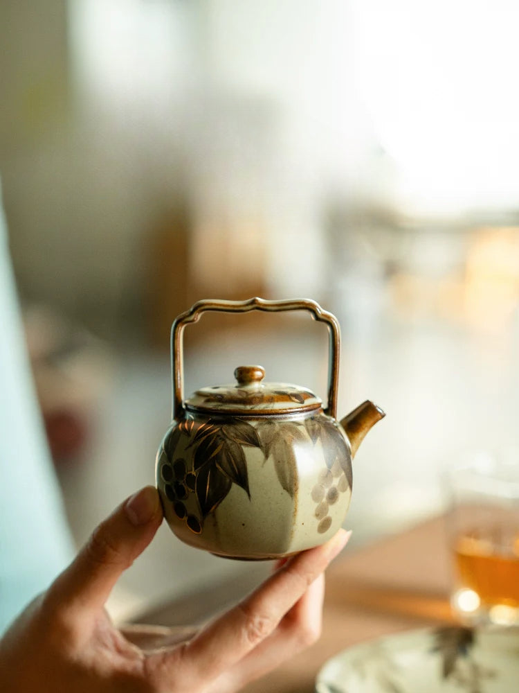 Octafoil Archaic Teapot with Blue-and-White Grapes and Gold Accents