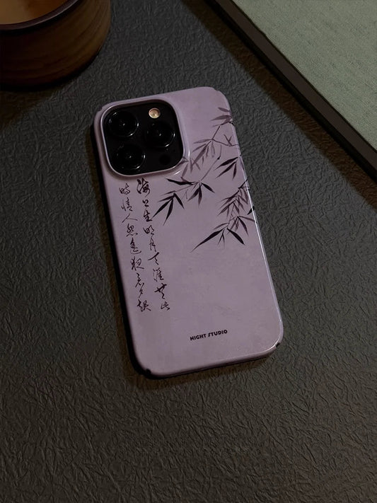 A purple phone case with a retro bamboo pattern, featuring precise cutouts for ports and camera, placed on a textured surface.