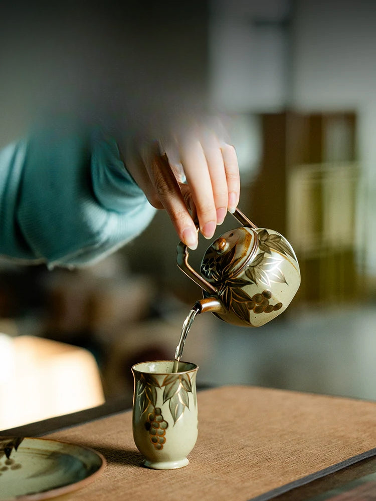 Octafoil Archaic Teapot with Blue-and-White Grapes and Gold Accents