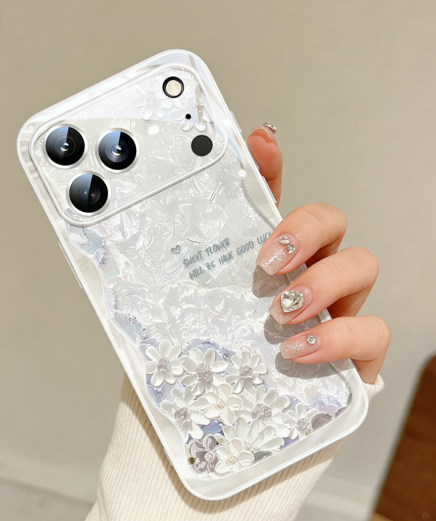 Ice phone case with floral design held by a hand