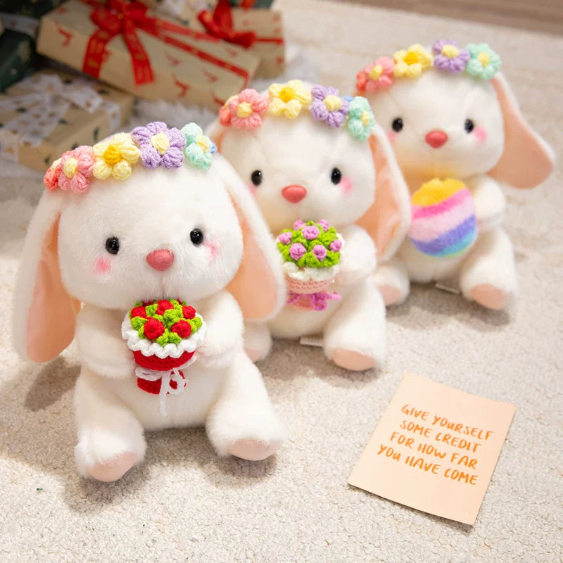 Easter bunny plush toy holding easter eggs and roses