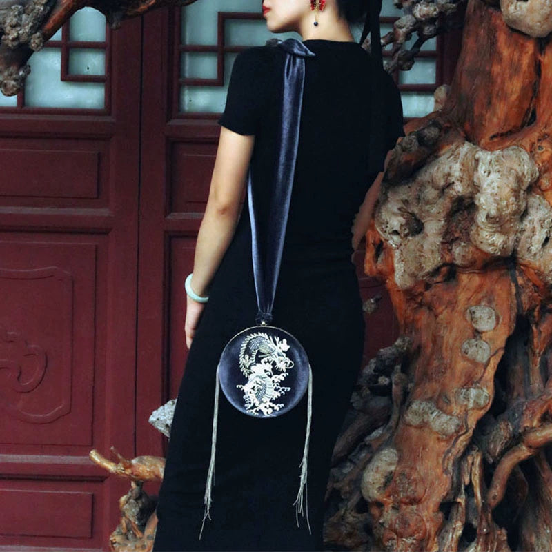 Gray velvet tassel closure bag