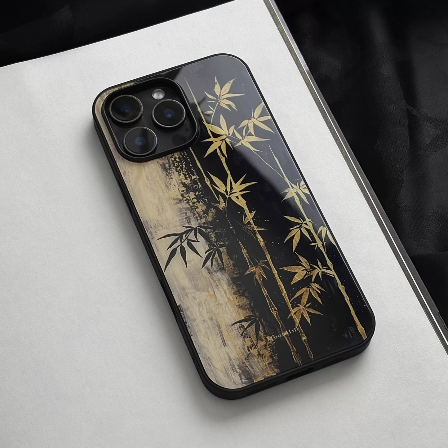 Black and gold bamboo pattern anti-slip full-coverage glass premium phone case