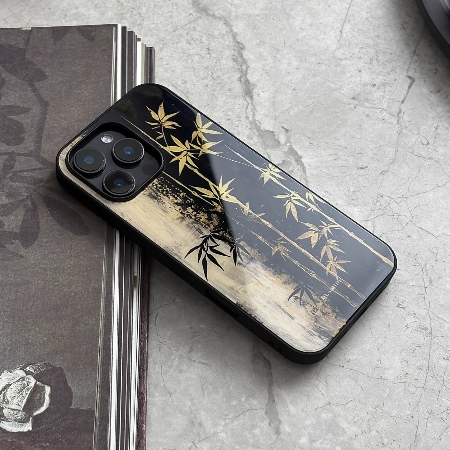 Black and gold bamboo pattern anti-slip full-coverage glass premium phone case