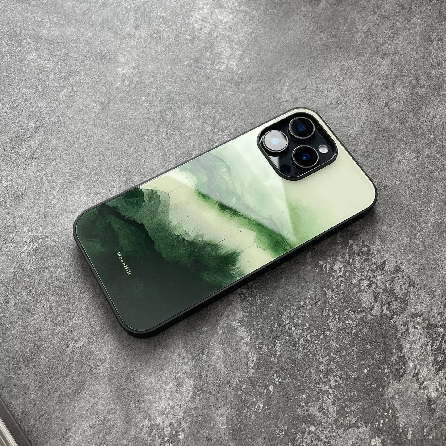 Green tree silhouette and anti-slip, full-coverage glass premium phone case