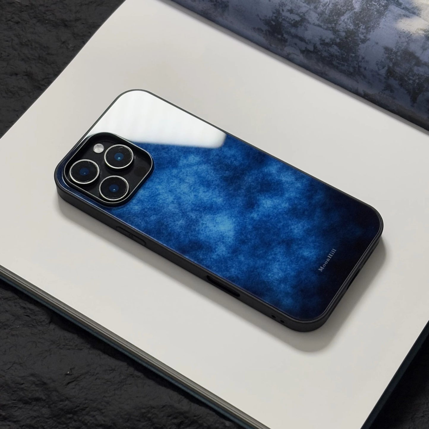 Mysterious lake surface art design, anti-slip, full-coverage glass premium phone case.