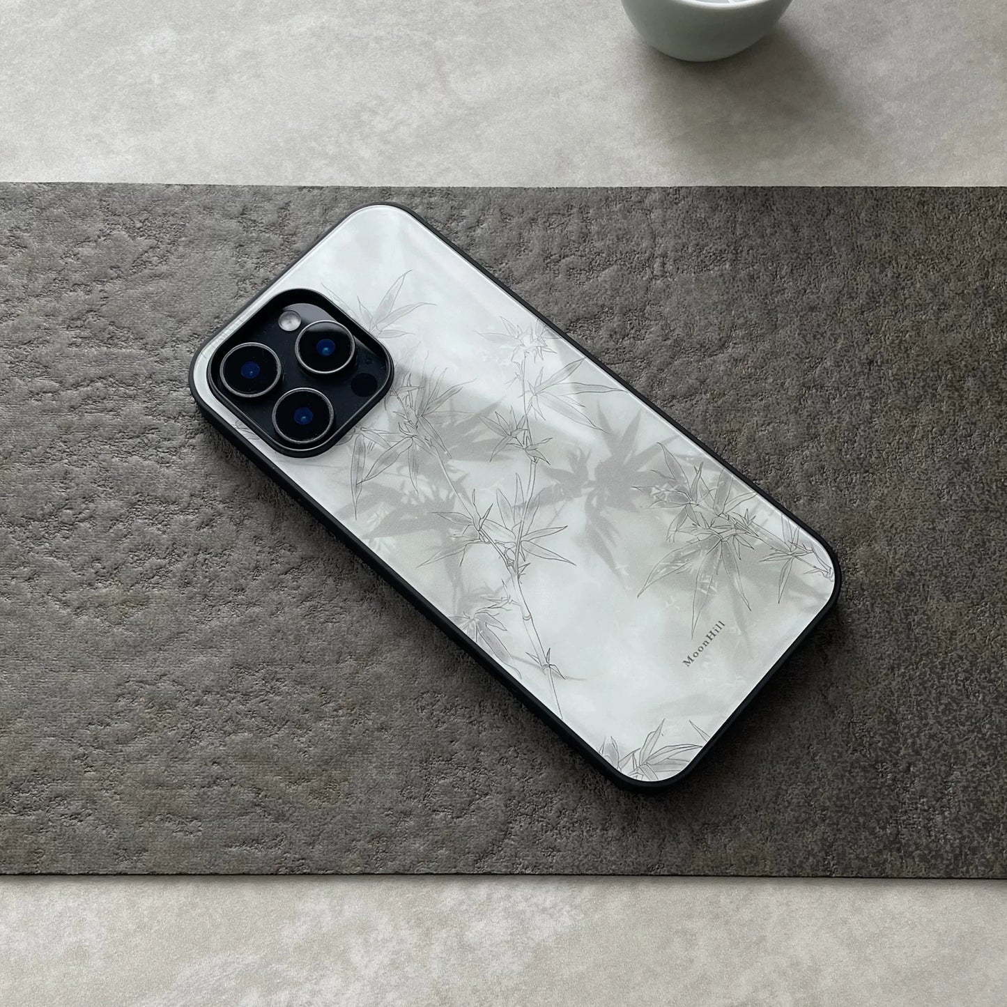 Abstract painting of bamboo shadows under moonlight, non-slip, full-coverage glass premium phone case.