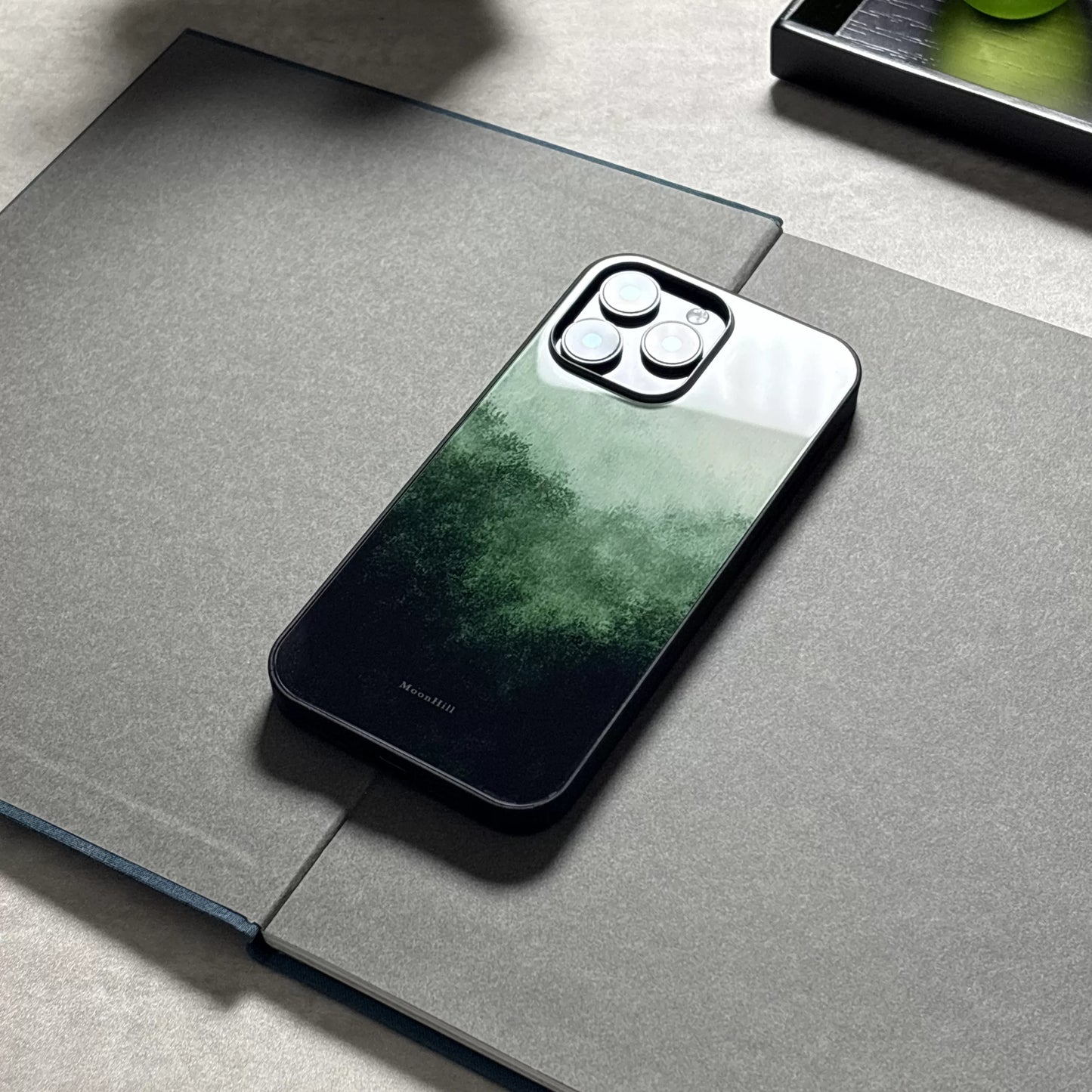 Dark green mountain silhouette anti-slip full-coverage glass premium phone case
