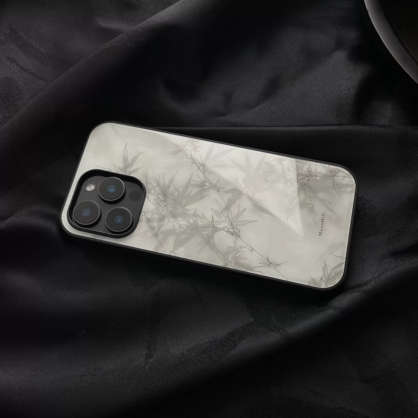 Abstract painting of bamboo shadows under moonlight, non-slip, full-coverage glass premium phone case.