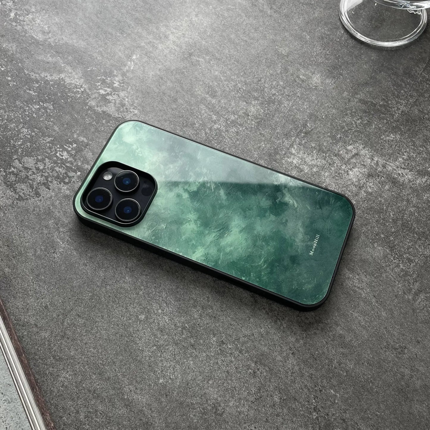 Emerald green lake bottom-inspired ink painting design, anti-slip, full-coverage glass premium phone cas