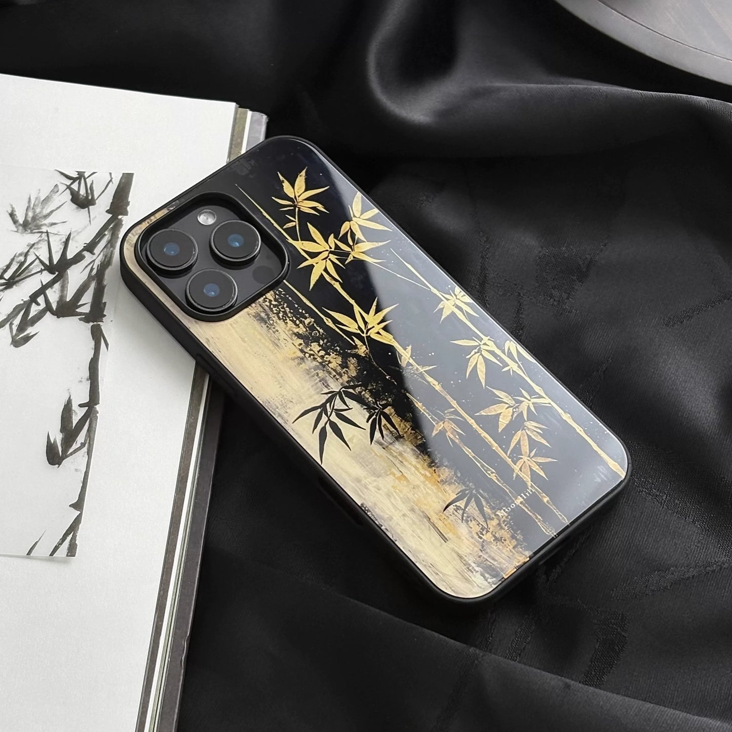 Black and gold bamboo pattern anti-slip full-coverage glass premium phone case