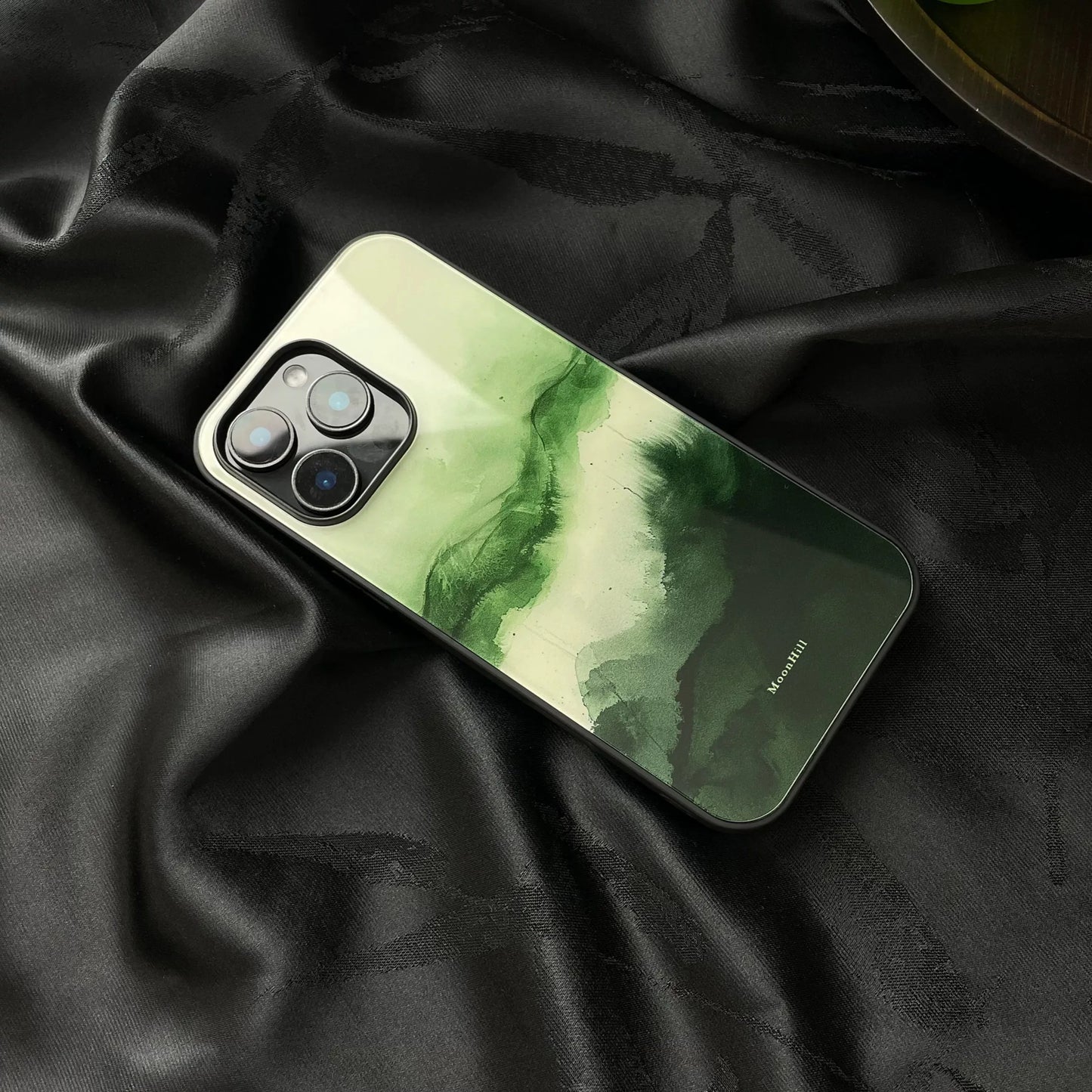Green tree silhouette and anti-slip, full-coverage glass premium phone case