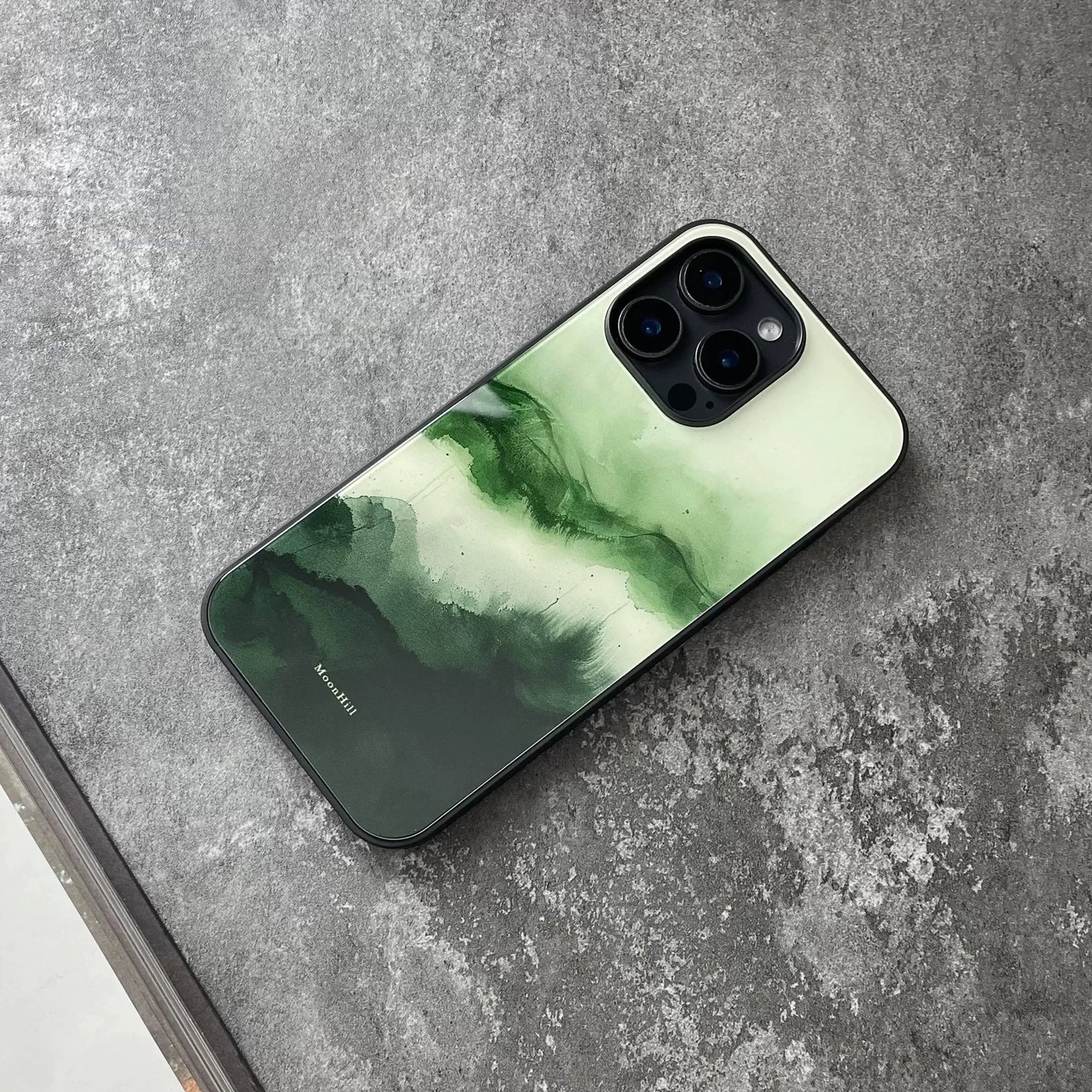 Green tree silhouette and anti-slip, full-coverage glass premium phone case