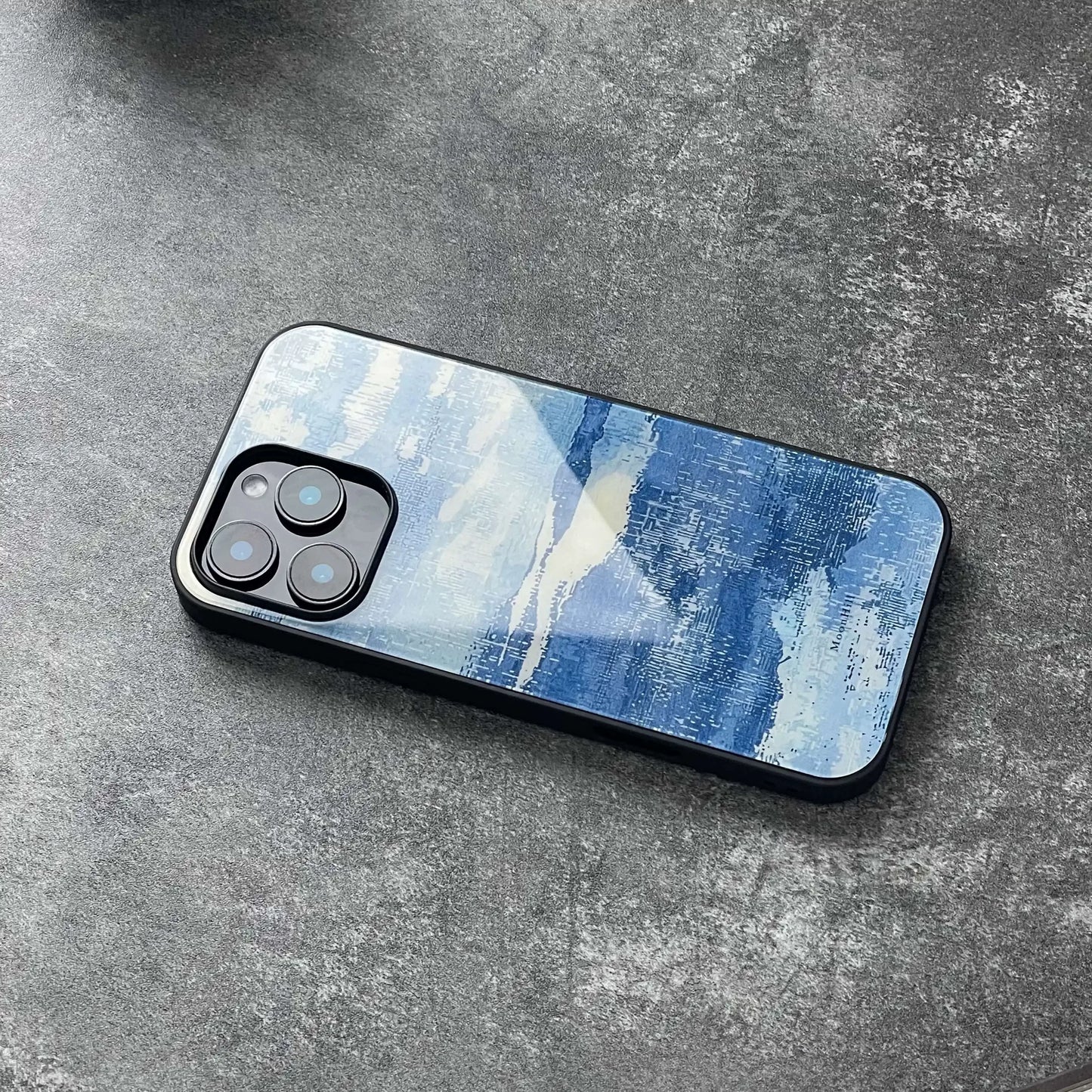 Blue and white, fully enclosed glass phone case with an original, high-end design
