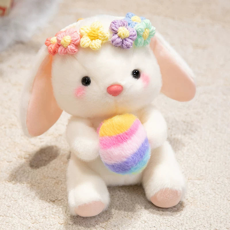 Easter bunny plush toy holding easter eggs and roses