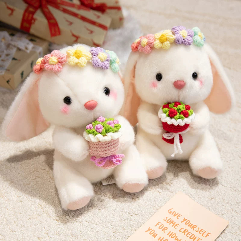 Easter bunny plush toy holding easter eggs and roses