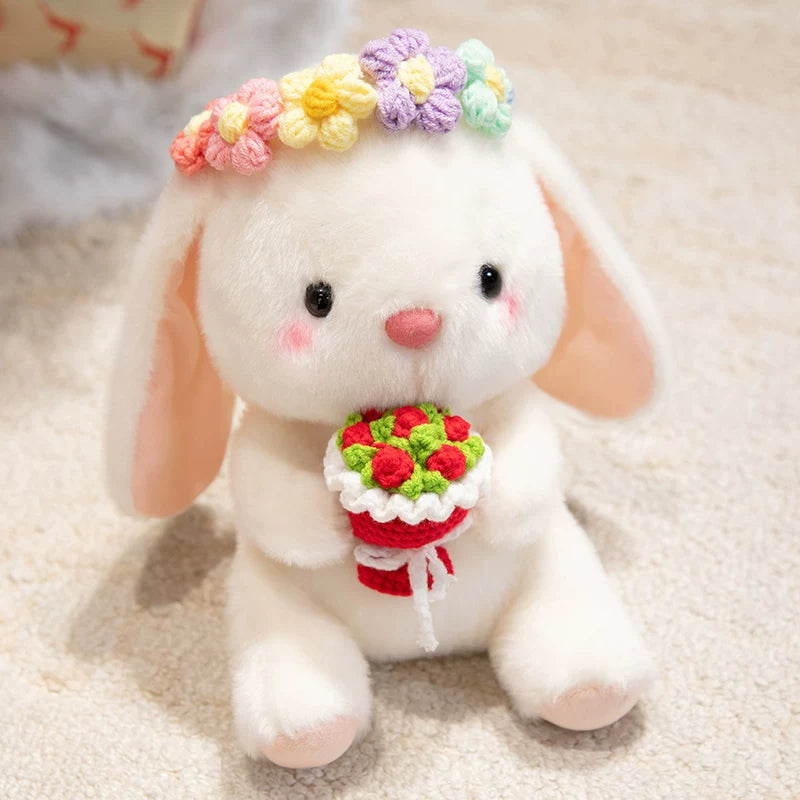 Easter bunny plush toy holding easter eggs and roses