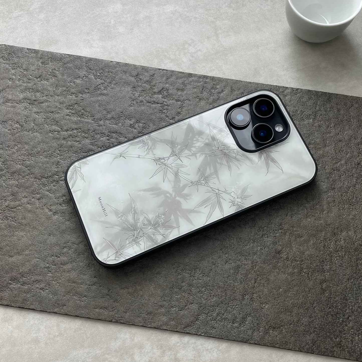 Abstract painting of bamboo shadows under moonlight, non-slip, full-coverage glass premium phone case.