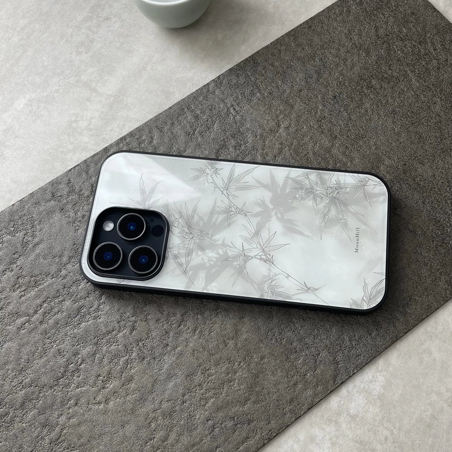 Abstract painting of bamboo shadows under moonlight, non-slip, full-coverage glass premium phone case.